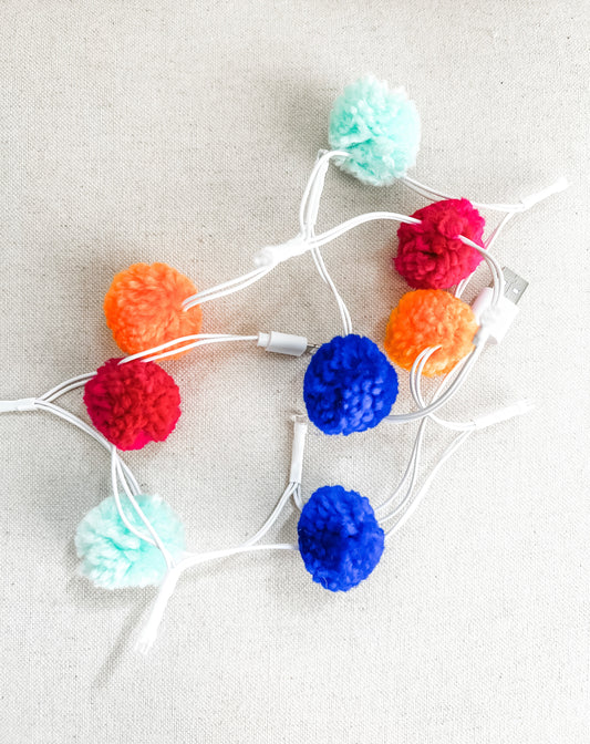 Pom Pom iPhone charger